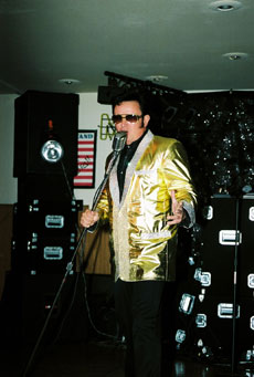 Mike as Elvis with gold lame costume